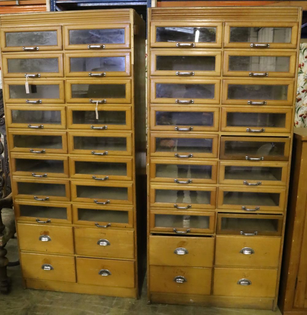 A pair of mid 20th century haberdashery cabinets, width 90cm depth 46cm height 199cm